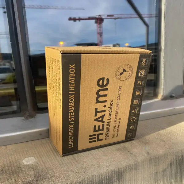 Cardboard PREMIUM lunchbox upright on windowsill